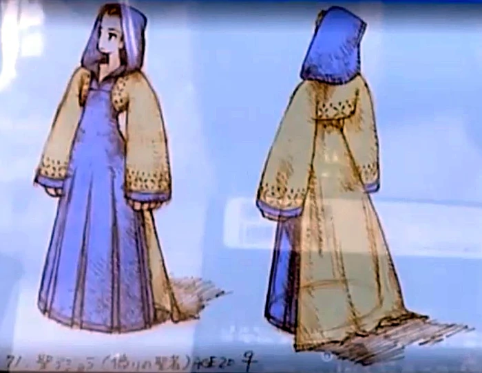 Concept art of Ajora Glabados. It depicts an androgynous figure in a long golden robe with a blue hooded apron-like garment over-top it. At the bottom of the image is text reading '71. 聖アジョラ(偽りの聖者) Age: 20 ♀.'